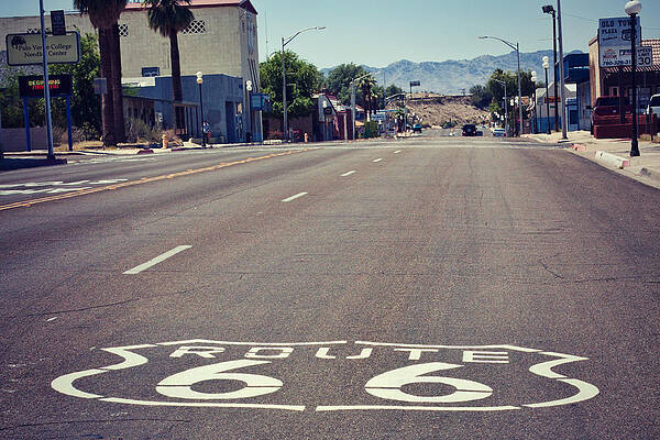 Wall Art featuring the photograph Route 66 Road Sign In Perspective by Tatiana Travelways