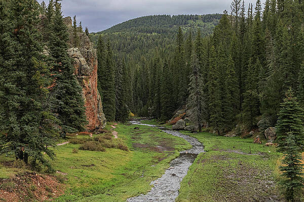 Sky Wall Art featuring the photograph Runoff Through The Rocks by Steve Templeton