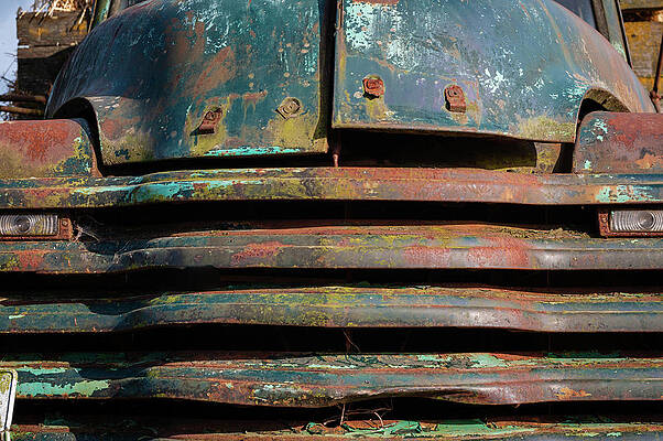 Blue Wall Art featuring the photograph Rusty Grill Of A Chevrolet Truck by Chad Thunberg