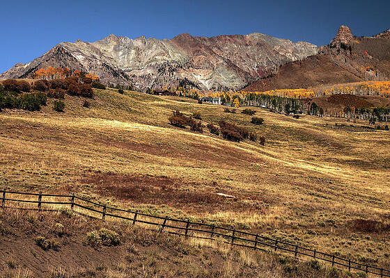 Wall Art featuring the photograph Rustic Telluride Fence In Autumn by Dan Sproul