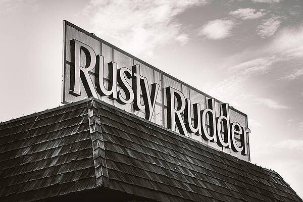 Sky Photograph - Rusty Rudder Sign by Jason Fink