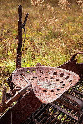 Fall Photograph - Rusty Seat Of Old Blueberry Picker by Craig A Walker
