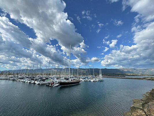 Sailboats Under Dramatic Sky Wall Art