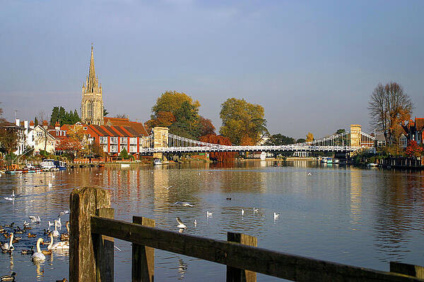 Tranquil Riverside Town with Church Photograph