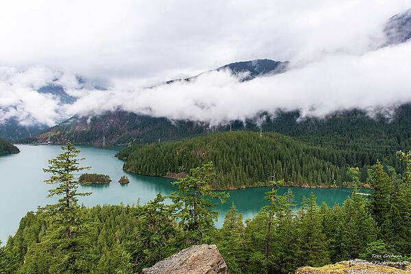 Scenic View of Mountainous Lake Photograph