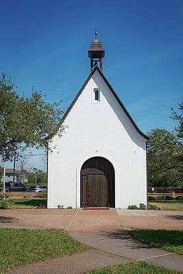 Charming White Chapel Under Blue Sky Wall Art