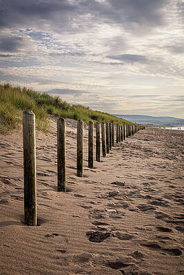 Sky Wall Art featuring the photograph Serene Coastal Fence At Sunset by Francisco Ruiz Navas