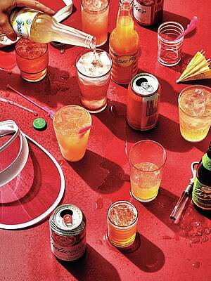 Wall Art featuring the photograph Shandies On A Red Table by Alex Lau