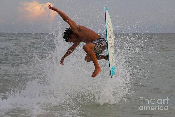 Athlete Photograph - Skimboarder's Dynamic Aerial Maneuver 3449 by Donn Ingemie