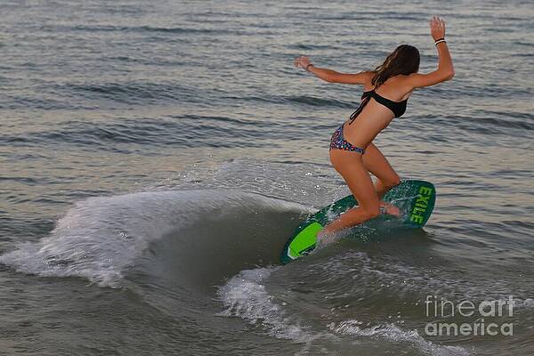 Skimboarding at Sunset Photograph