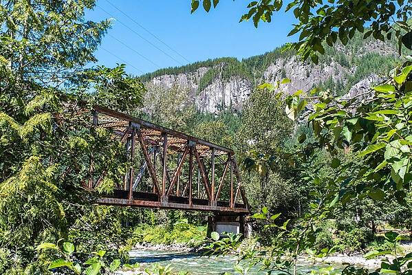 Sky Wall Art featuring the photograph Sky River Rail Bridge And Upper Town Wall by Tom Cochran