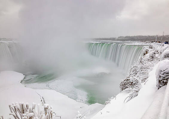 Majestic Winter Waterfall Scene Photograph