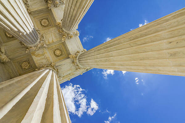 Architecture Wall Art featuring the photograph Soaring Columns Of The Supreme Court Building by Elvira Peretsman