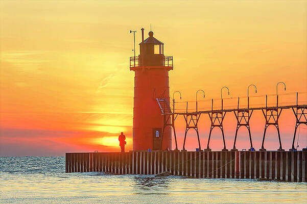 Lighthouse Silhouette at Sunset Photograph