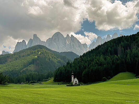 Chapel Amidst Majestic Mountains Photograph