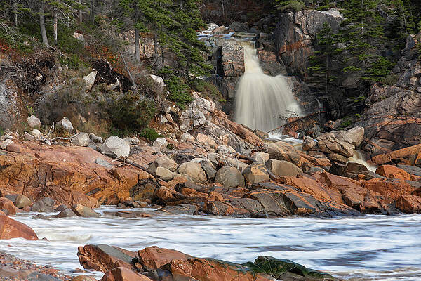 Majestic Waterfall in Rocky Terrain Photograph