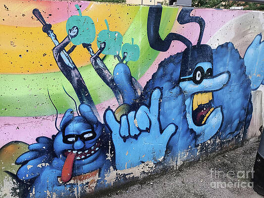 The Beatles Wall Art featuring the digital art Street Art #16 - Blue Meanies by Antonios Valamontes