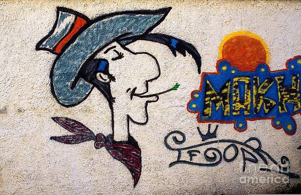 Graffito Wall Art featuring the digital art Street Art #68 - Lucky Luke by Antonios Valamontes