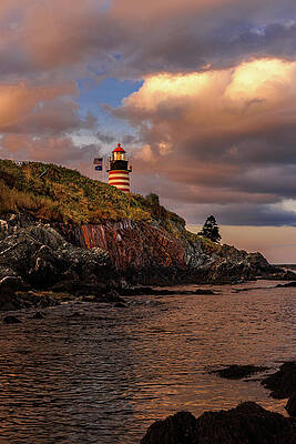 Reflection Photograph - Sunset At West Quoddy Lighthouse by Richard DeYoung