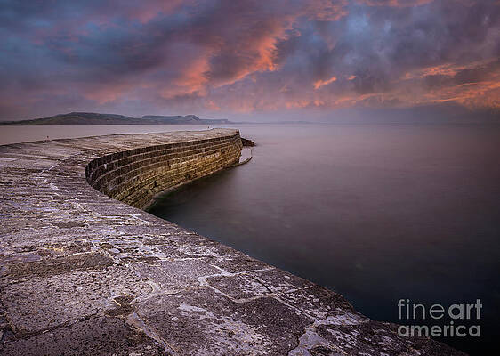 Dramatic Photograph - Sunset Over The Cobb, Lyme Regis, Dorset, England by Neale And Judith Clark
