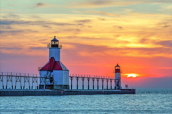 Sunset Over Pier Lighthouses Photograph