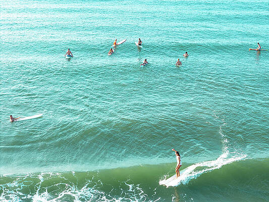 Surfers Riding the Ocean Waves Wall Art