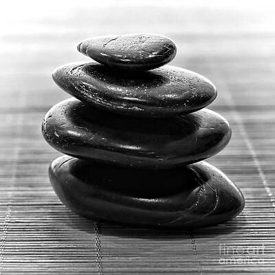Wall Art featuring the photograph Symbolic Black Zen Stone Cairn For Calm Meditation by Olivier Le Queinec