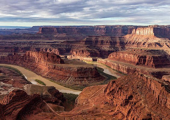 Cloud Wall Art featuring the photograph The Colorado River At Dead Horse Point State Park by Ed Clark
