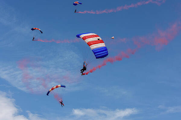 Parachute Sky Divers Against Blue Sky Photograph
