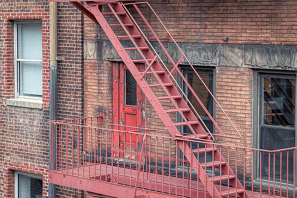 Wall Art featuring the photograph The Fire Escape by Penny Polakoff