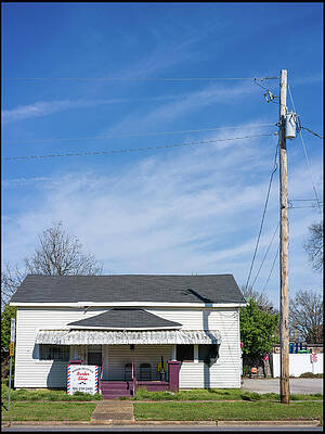 Barbershop under a Clear Blue Sky Wall Art