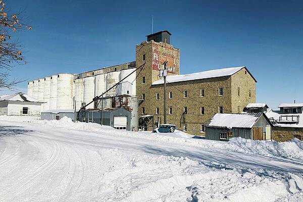Wall Art featuring the photograph The Montana Flour Mills Company - Harlowton, MT, At Wintertime by Tatiana Travelways
