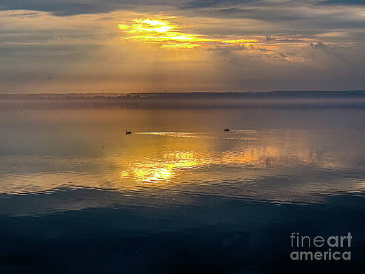 Serene Wall Art featuring the photograph The Rising Sun by William Norton