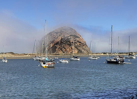 Wall Art featuring the photograph The Rock And Fog And Sailboats by Joe Schofield