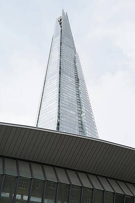 The Shard Against a Cloudy Sky Wall Art