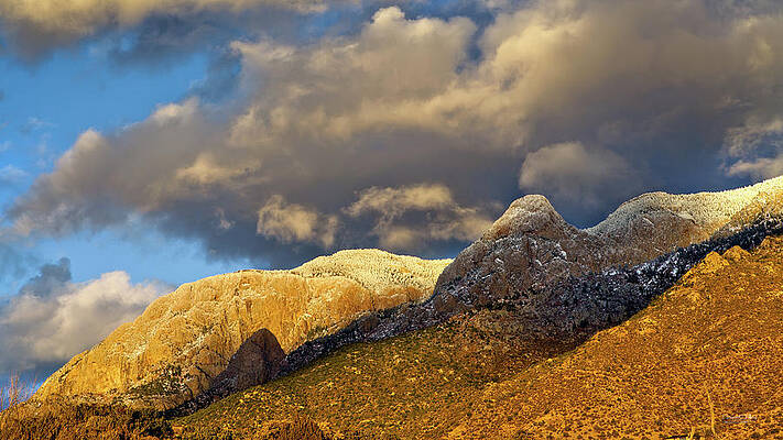 Sky Wall Art featuring the photograph The Shield Takes The Full Force Of The Setting Sun by Howard Holley