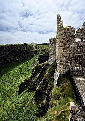 Ancient Castle Ruins on Cliffside Photograph