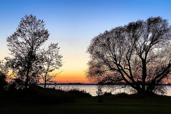 Serene Wall Art featuring the photograph Tranquil Twilight Serene Sunset By The Waters by Travel Essayist