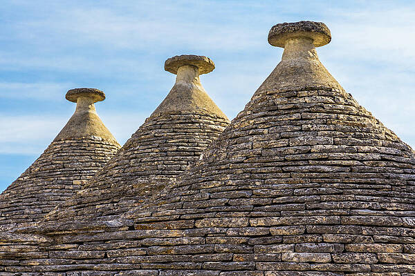 Architecture Wall Art featuring the photograph Tre Amici - Trulli Roof Tops In Alberobello, Italy by Elvira Peretsman