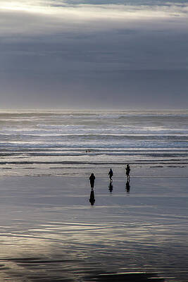 People Walking on Beach at Dusk Wall Art
