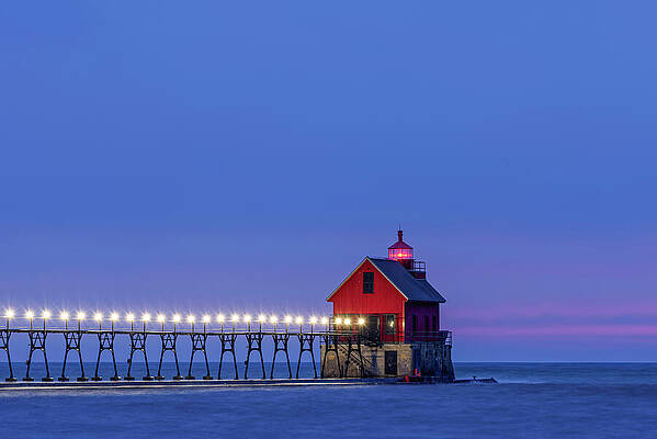 Fall Wall Art featuring the photograph Twilight At The Grand Haven Lighthouse by Michael Collins