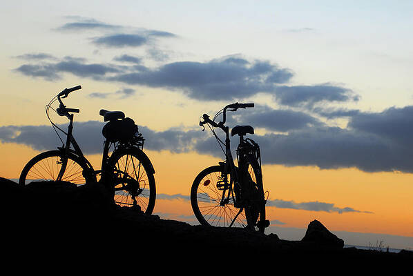 Sky Wall Art featuring the photograph Two Bikes On The Mountain Sunset Landscape by Severija Kirilovaite