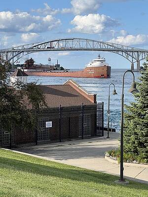 Wall Art featuring the photograph Up Bound Ship Under The  Blue Water Bridge, Port Huron Michigan by Lloyd Gillies