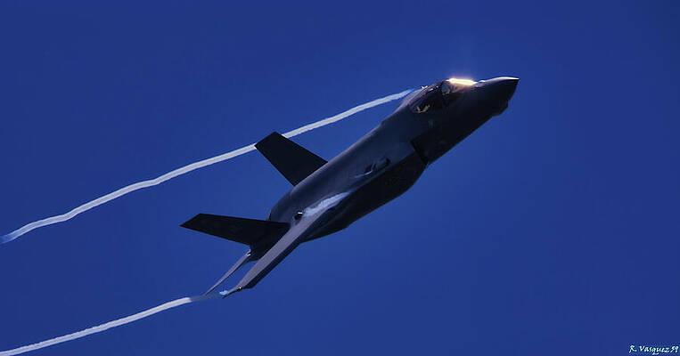 Sky Wall Art featuring the photograph US Air Force F-35 With Con-Trails by Rene Vasquez