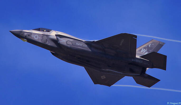 Sky Wall Art featuring the photograph US Marine F-35 With Con-Trails by Rene Vasquez