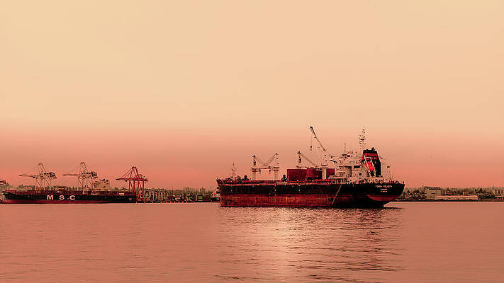 Cargo Ships at Sunset Photograph