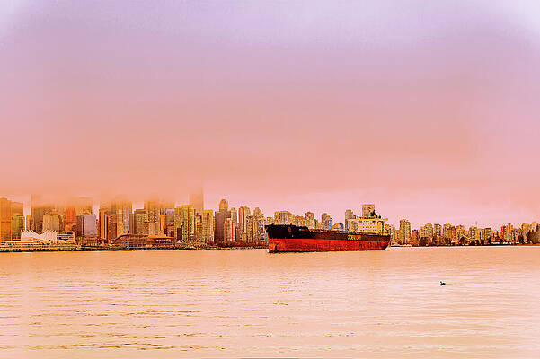 Cargo Ship in Front of City Skyline Photograph