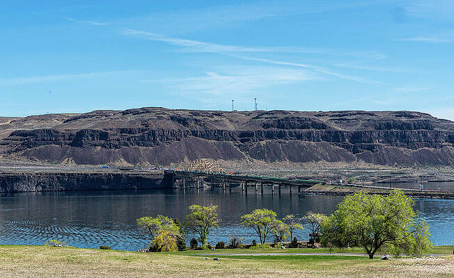 Tranquil River Under Blue Sky Wall Art