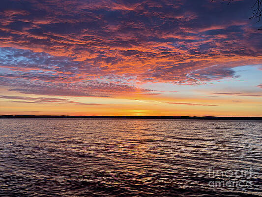 Vibrant Sunset Over Tranquil Lake Photograph