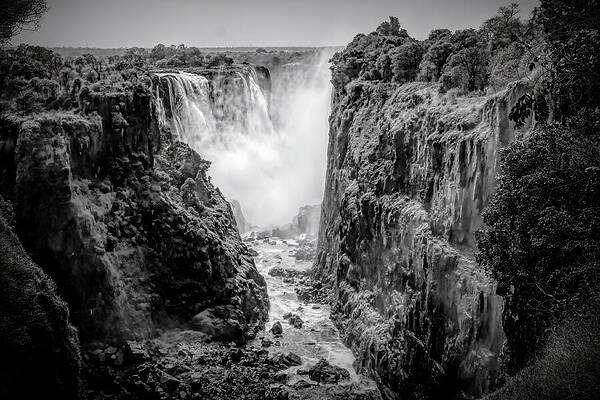 Wall Art featuring the photograph Victoria Falls From Zimbabwe, Africa BW by John Twynam